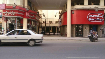 <a class="fancybox" rel="gallery-" href="https://passageways.clustermappinginitiative.org/sites/default/files/styles/largest/public/d18_001.jpg?itok=2IaukWva" title="Entrance of Cinema Radio Passage from Talaat Harb Street">Enlarge</a><br >2015, Aug 09<br>Entrance of Cinema Radio Passage from Talaat Harb Street
